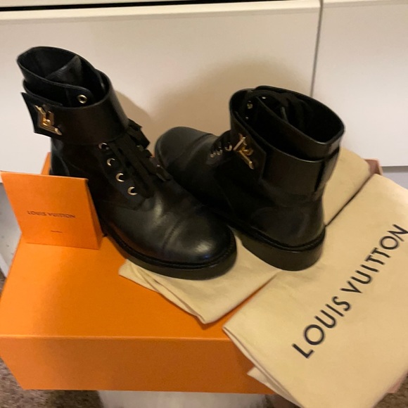 Authentic 7 LV blk boots with gold hardware. - Picture 1 of 2